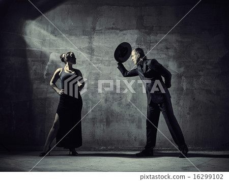 Man and woman dancers, concrete building surroundings Man and woman dancers, concrete building surroundings 16299102