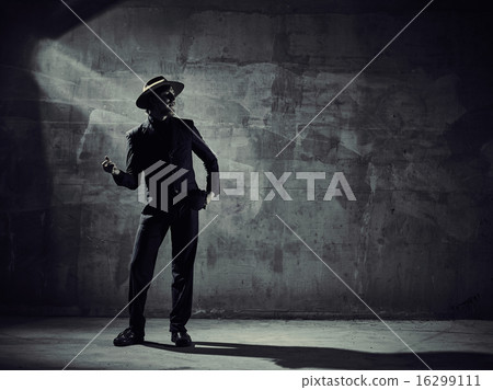 Male dancer, concrete building surroundings 16299111