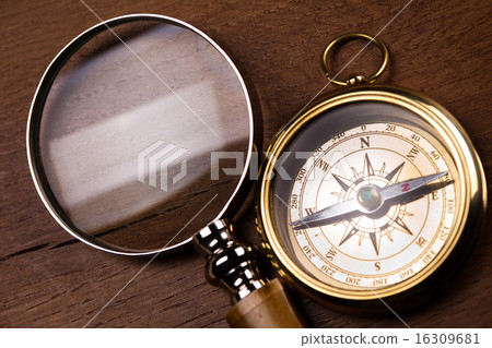 Magnifying glass and old map, colorful Magnifying glass and old map, colorful 16309681