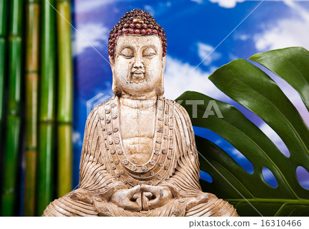 Buddha and blue sky background, vivid colors Buddha and blue sky background, vivid colors 16310466