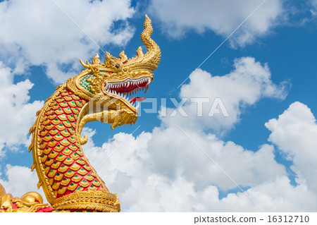 The golden great naga statue in blue sky 16312710
