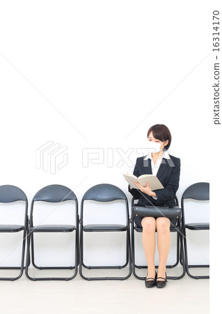 A woman waiting for turns 16314170
