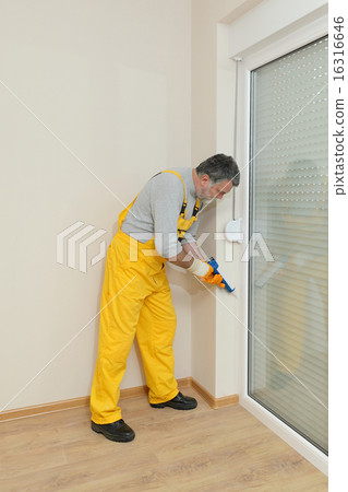 Home renovation, caulking with silicone 16316646