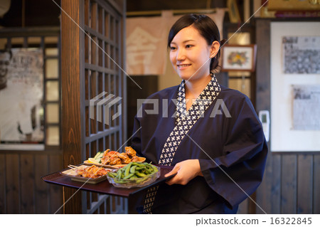 A young girl working in a pub A young girl working in a pub 16322845