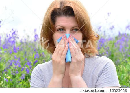 adult woman with allergies on the Meadow 16323638