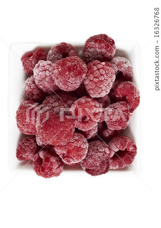 Frozen raspberries in a white porcelain dish 16326768