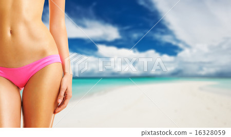 Woman on beautiful beach at Maldives 16328059