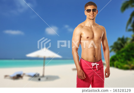 Man on beach at Maldives Man on beach at Maldives 16328129