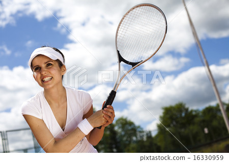 Playing tennis, natural colorful tone 16330959