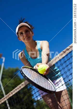 Young woman playing tennis, natural colorful tone 16331212