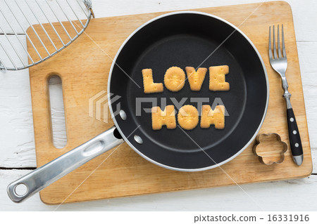 Letter cookies word LOVE MOM and kitchen utensils Letter cookies word LOVE MOM and kitchen utensils 16331916