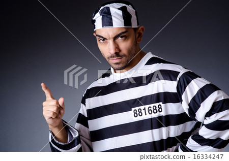 Convict criminal in striped uniform Convict criminal in striped uniform 16334247