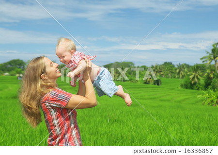 Mother with son on green rice terraces Mother with son on green rice terraces 16336857