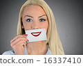Woman holding card with smile sketch 16337410