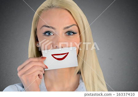 Woman holding card with smile sketch Woman holding card with smile sketch 16337410