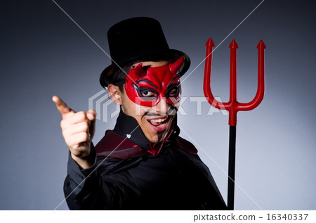 Man in devil costume in halloween concept 16340337