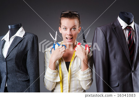 Woman tailor working on clothing Woman tailor working on clothing 16341083