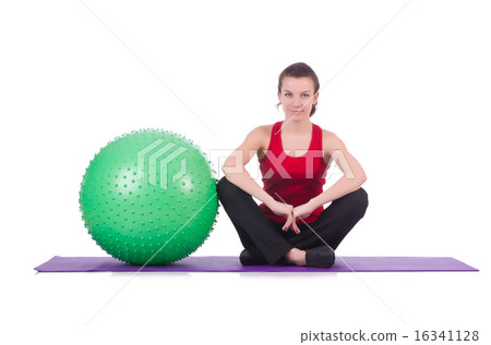 Young woman with ball exercising on white Young woman with ball exercising on white 16341128