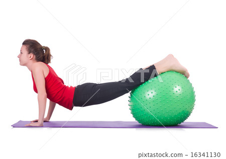 Young woman with ball exercising on white Young woman with ball exercising on white 16341130