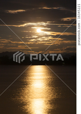 Full moon shining down on the river. Full moon shining down on the river. 16345221