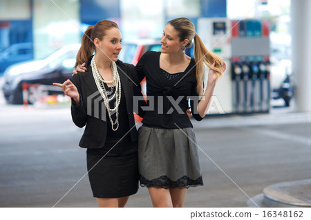 two girlfriends talk two girlfriends talk 16348162