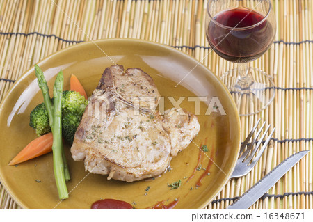 T-bone pork steak and red wine T-bone pork steak and red wine 16348671