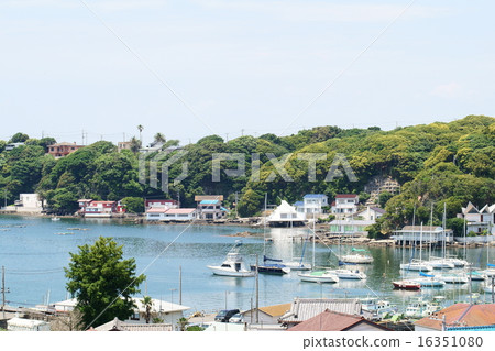 Beach and sailboat 16351080