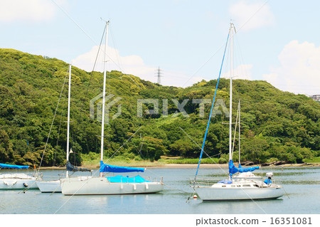 Beach and sailboat Beach and sailboat 16351081