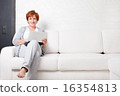 Mature woman with laptop 16354813
