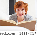 Adult woman reading book 16354817
