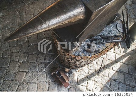 Vise and anvil in a forge shop Vise and anvil in a forge shop 16355034