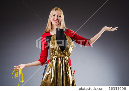 Woman tailor working on clothing Woman tailor working on clothing 16355606