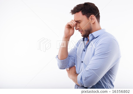 Attractive young man is expressing negative emotions 16356802