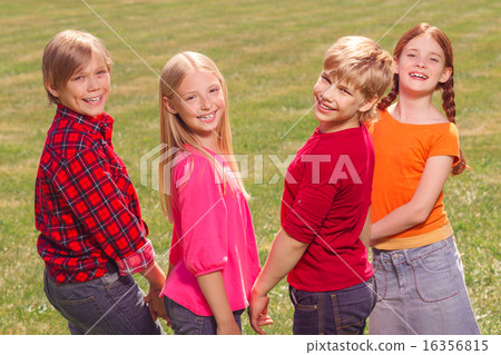 Smiling children standing together 16356815