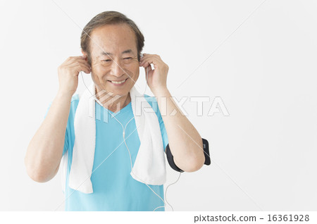 Senior men listening to music while exercising Senior men listening to music while exercising 16361928
