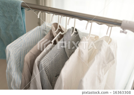 Laundry drying indoors by the window Laundry drying indoors by the window 16363308