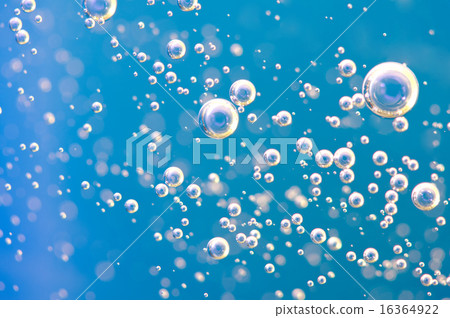 Macro Oxygen bubbles in water on blue background 16364922