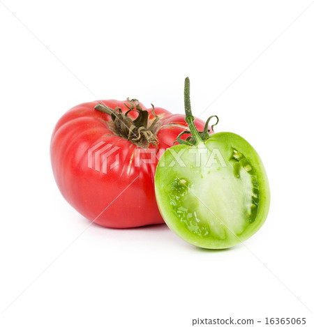 Red tomato and half of green tomato on white Red tomato and half of green tomato on white 16365065