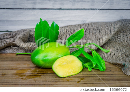 Mango on a wooden table 16366072