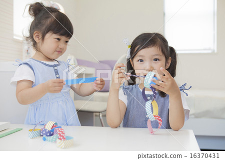 Girls playing at home 16370431