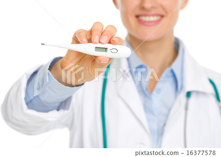 Closeup on thermometer in hands of smiling medical doctor 16377578