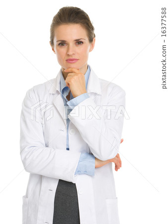 Portrait of thoughtful woman in white robe Portrait of thoughtful woman in white robe 16377588