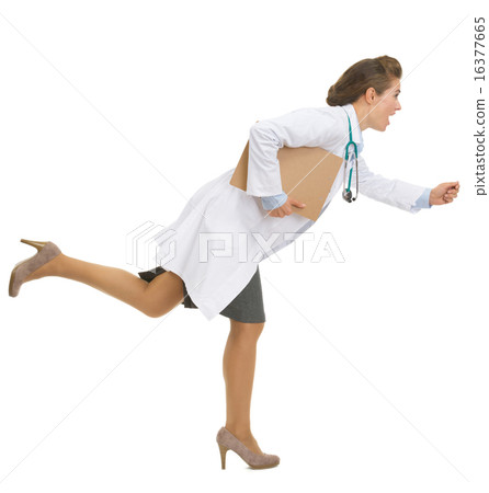 Full length portrait of running medical doctor woman 16377665