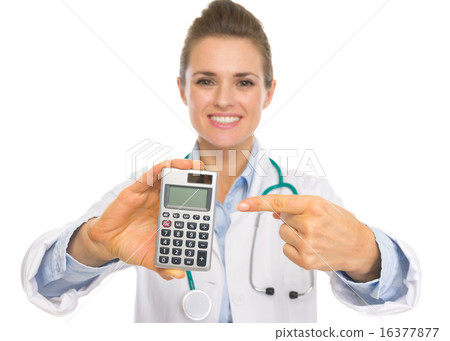 Closeup on doctor woman pointing on calculator Closeup on doctor woman pointing on calculator 16377877