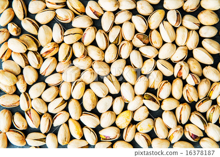 Closeup on full frame of pistachio. directly above. background 16378187