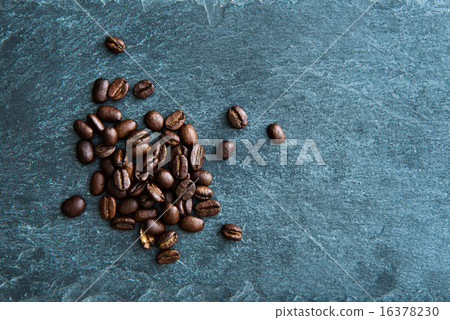 Closeup on coffee beans on stone substrate 16378230