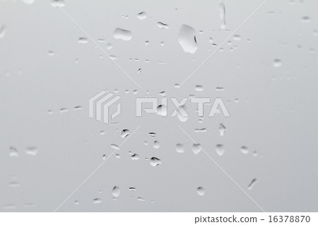 Drops of water on glass 16378870