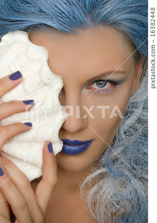 Stock Photo: woman with blue hair and shell of person