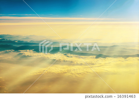 View from a plane to sunset on the sky 16391463
