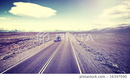Retro toned country highway in Argentina. 16397090